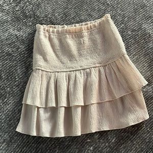 The Impeccable Pig cream colored skirt